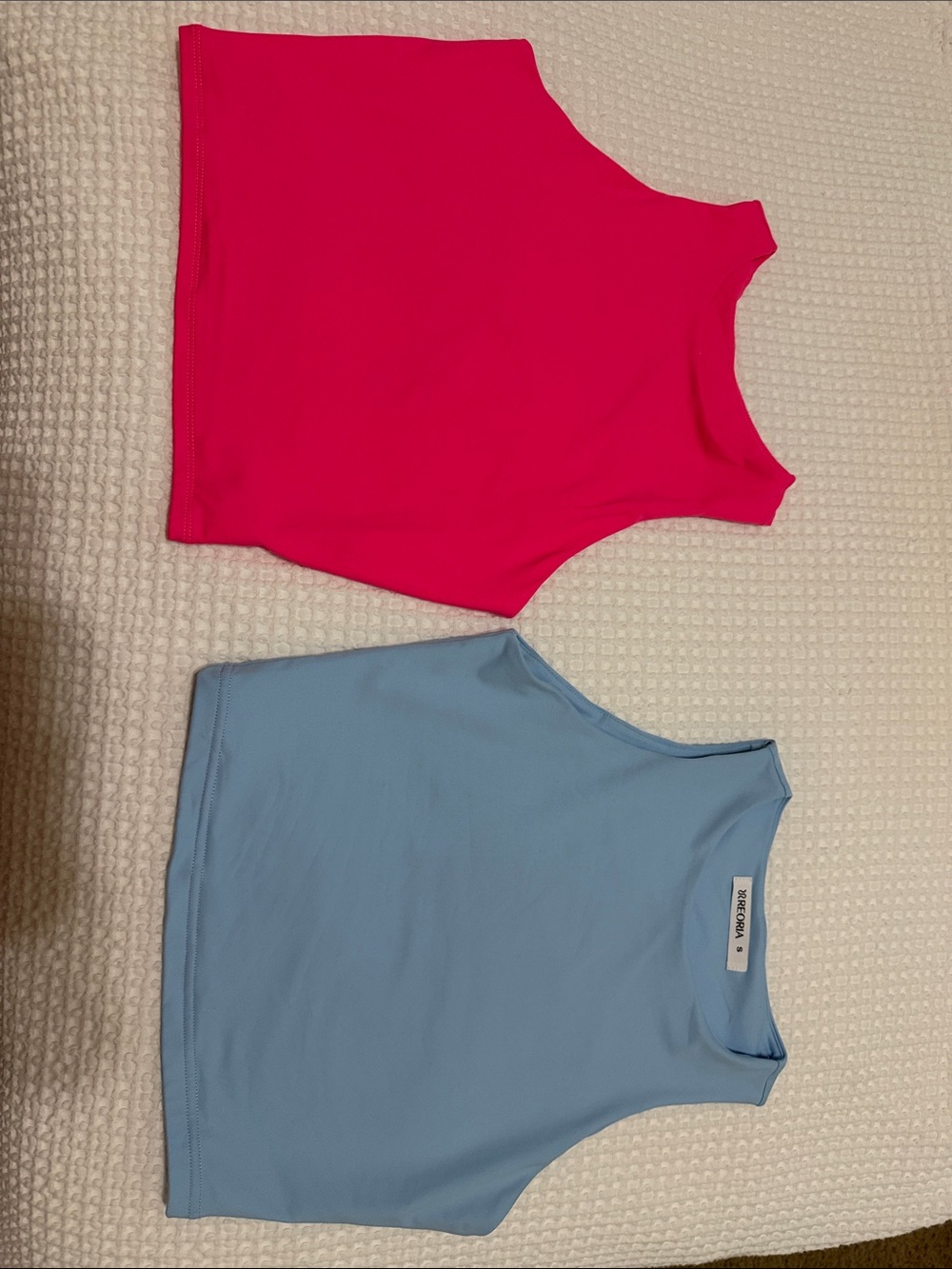 Hot pink and baby blue work out tops